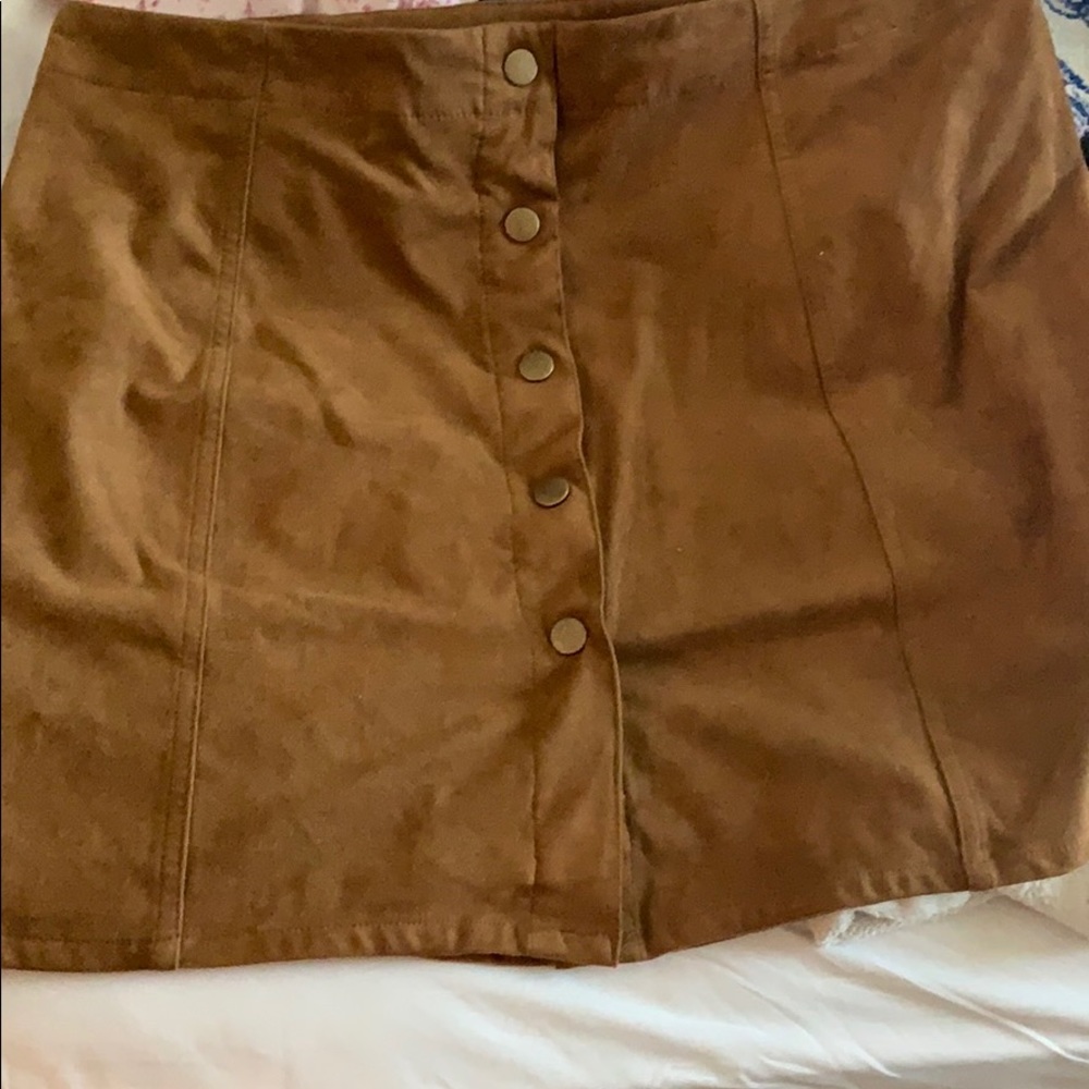 A brown button skirt